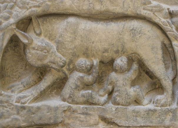 Carving of Romulus and Remus being suckled by a she wolf